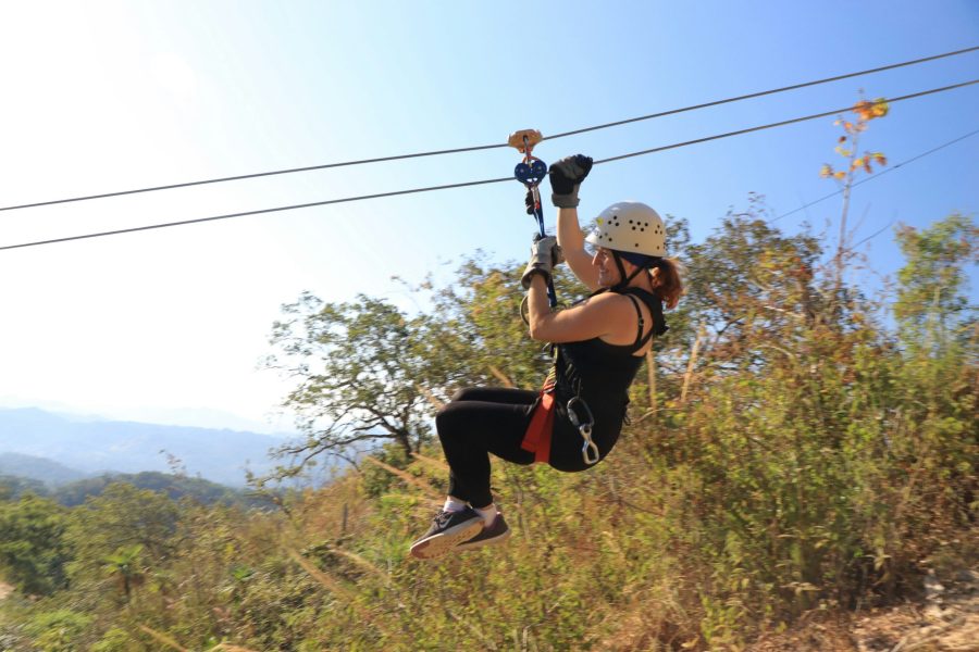 Ziplining in the Bush woman Ziplining over trees