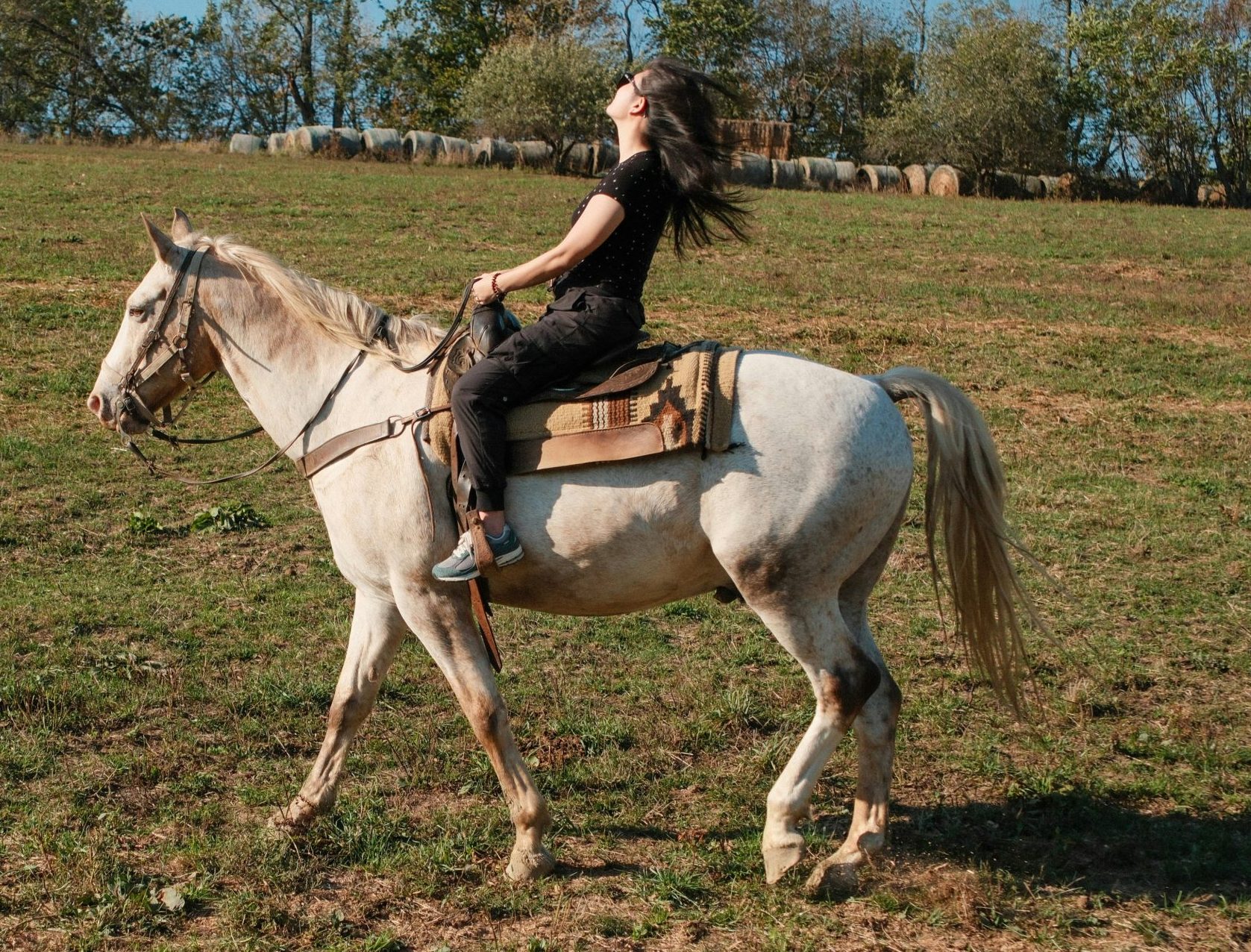 Horse Riding Riding on White Horse with wind blowing hair