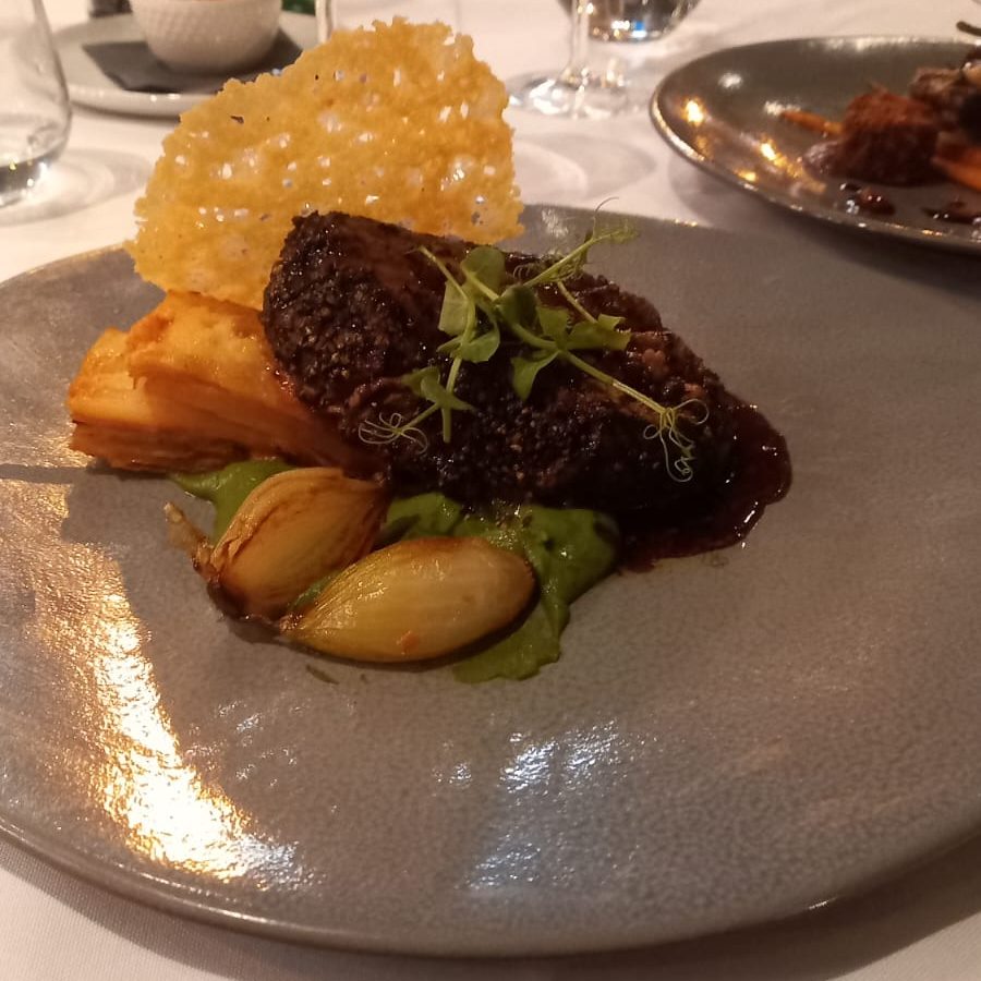 Aurum Pepper crusted fillet steak with Dauphine Mousaka.